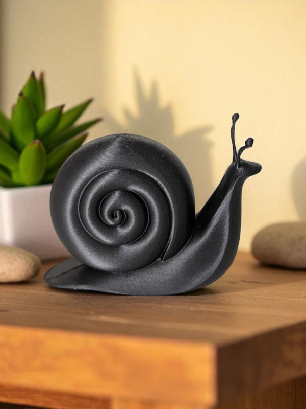 6883845747_dekorativnaya-figurka-snail.png Декоративна фігурка “Snail Deco” — символ спокою та затишку Декор інтер’єру | Декор равлик | Стильна фігурка з сучасним дизайном
