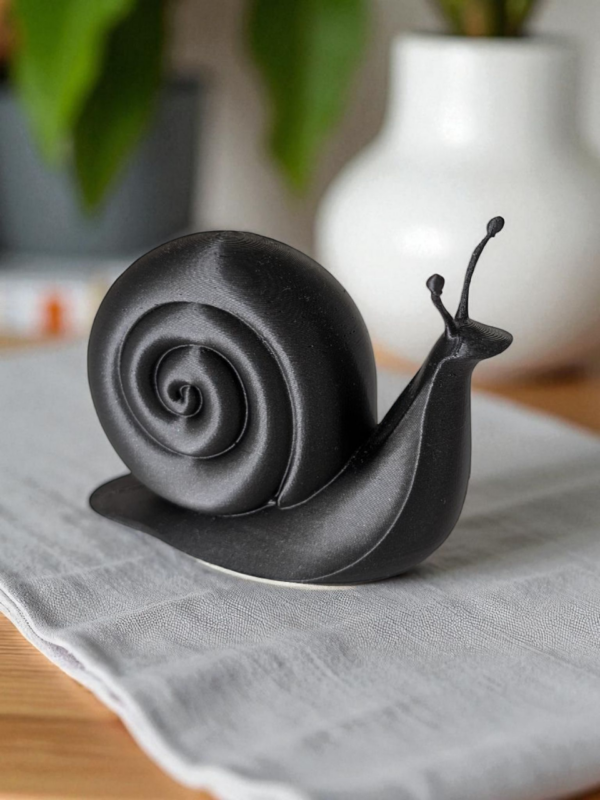 6883845750_dekorativnaya-figurka-snail.png Декоративна фігурка “Snail Deco” — символ спокою та затишку Декор інтер’єру | Декор равлик | Стильна фігурка з сучасним дизайном